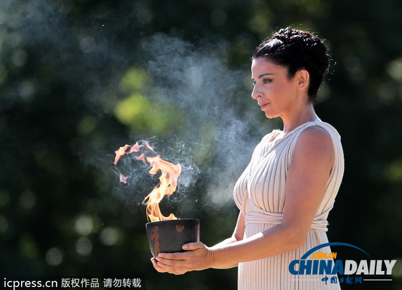 索契冬奧會希臘采集圣火火炬?zhèn)鬟f啟動開幕倒計時